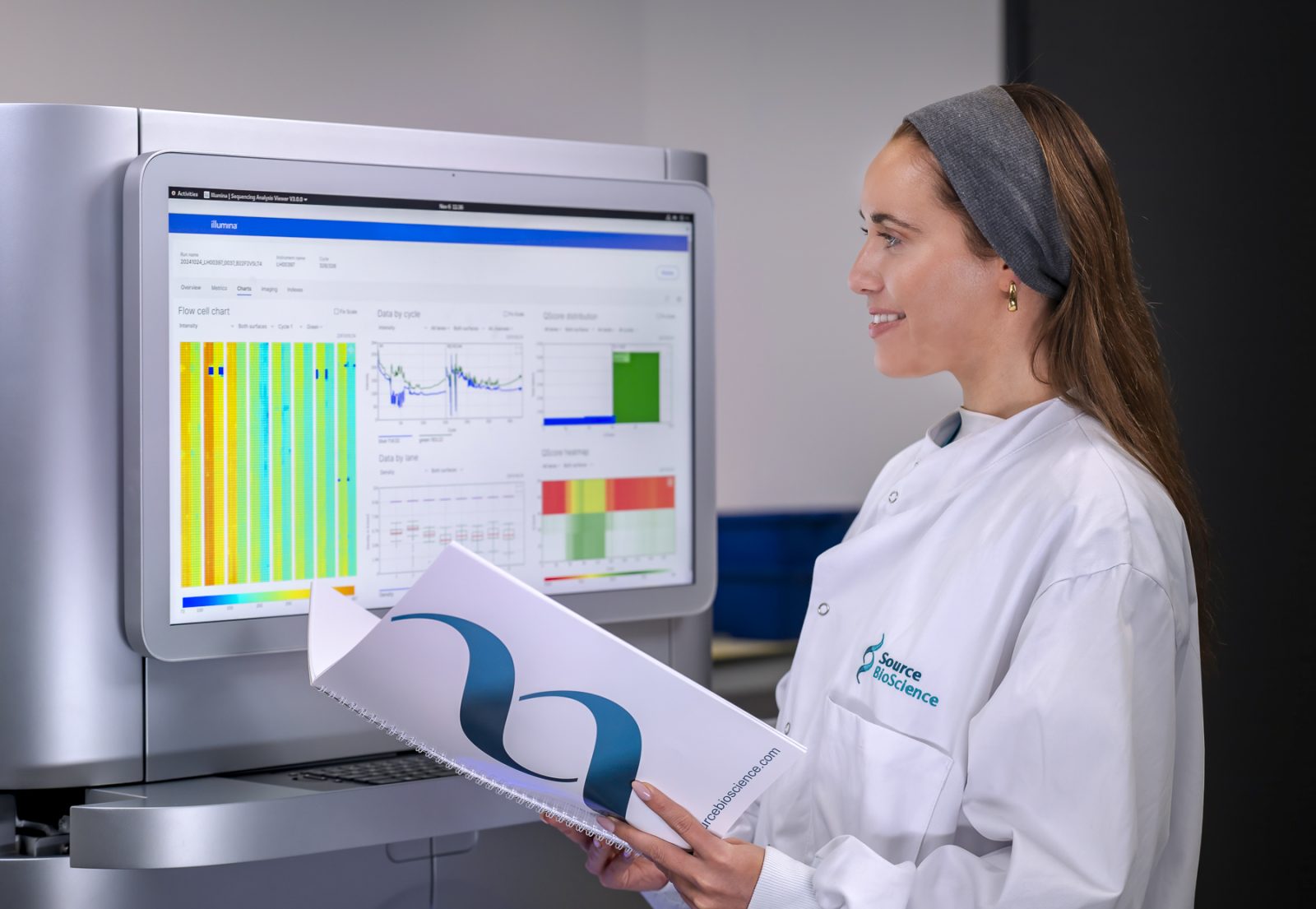 Scientist using sequencing machine © Leo Hillier